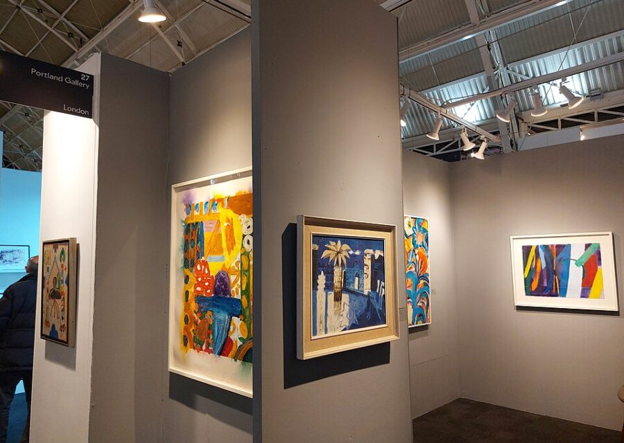 Paintings displayed in the Portland Gallery stand at the London Art Fair.